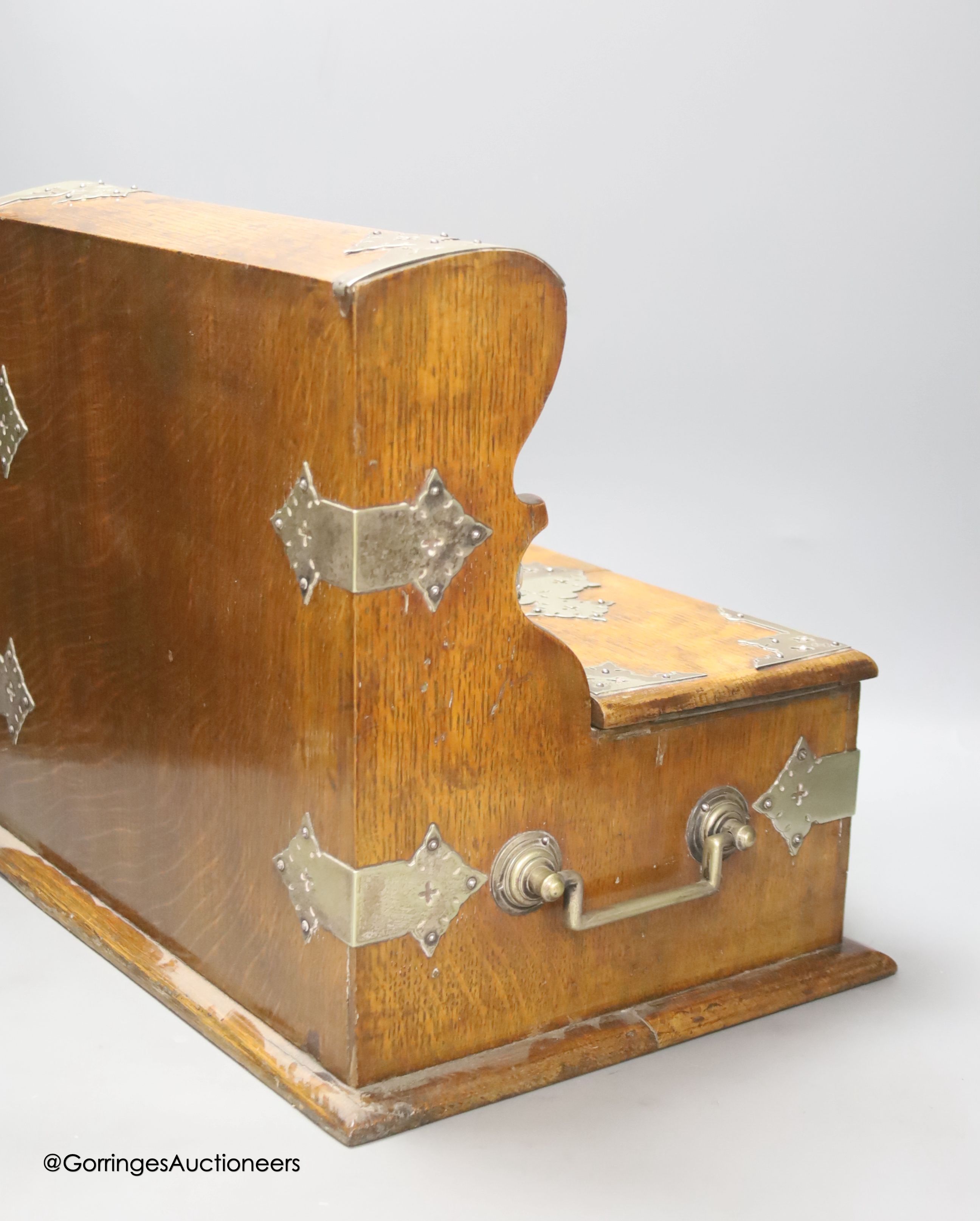 A Victorian oak tantalus and games compendium, height 33cm depth 29cm width 38cm